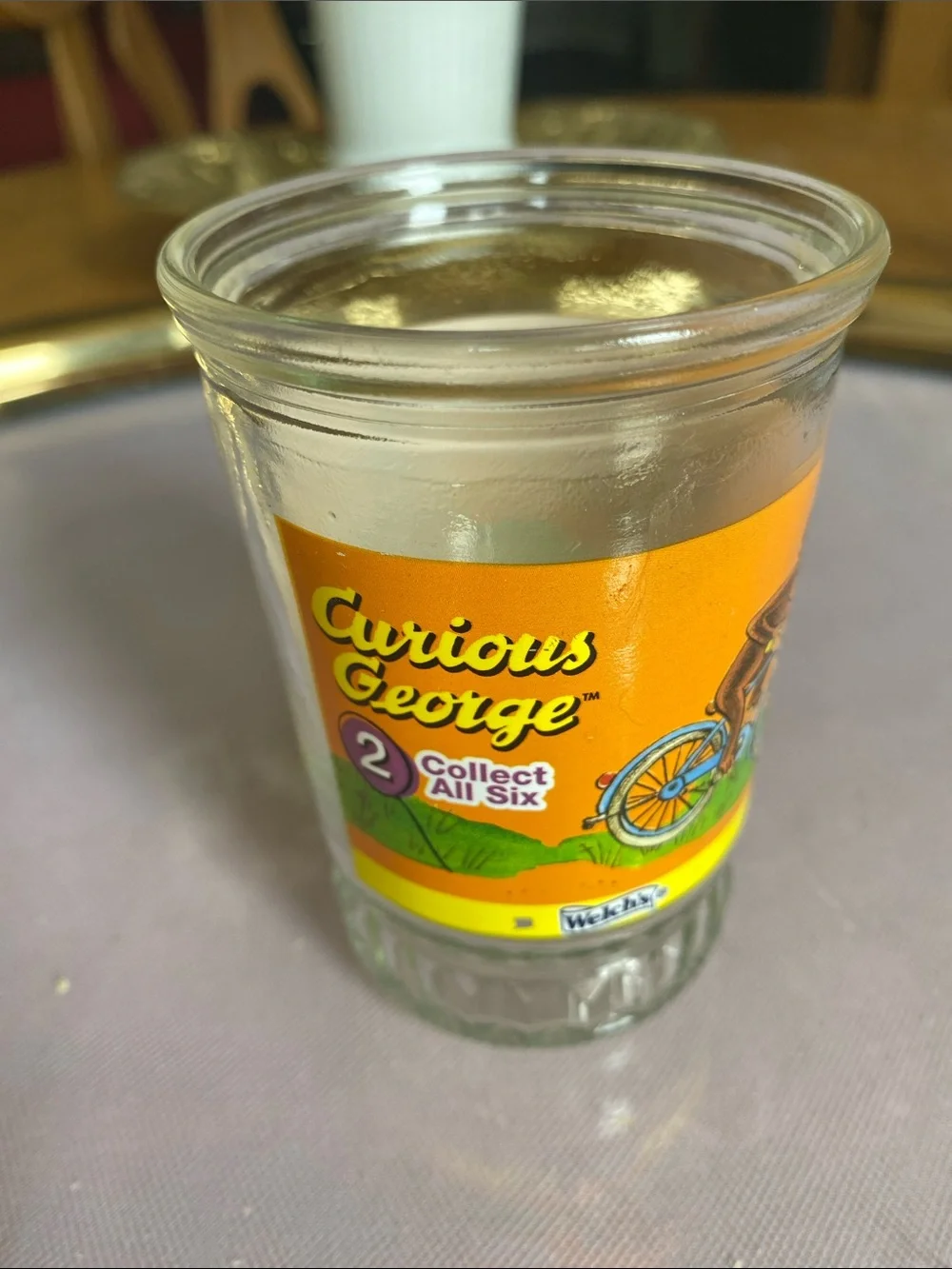 Vintage Welch’s Curious George Glass jelly Jar/ juice glass with Orange Label